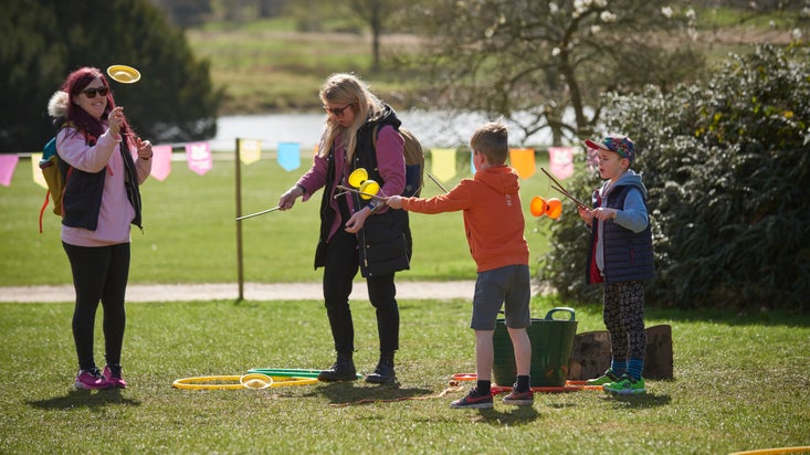 A family enjoying the Easter Trail at Clumber Park